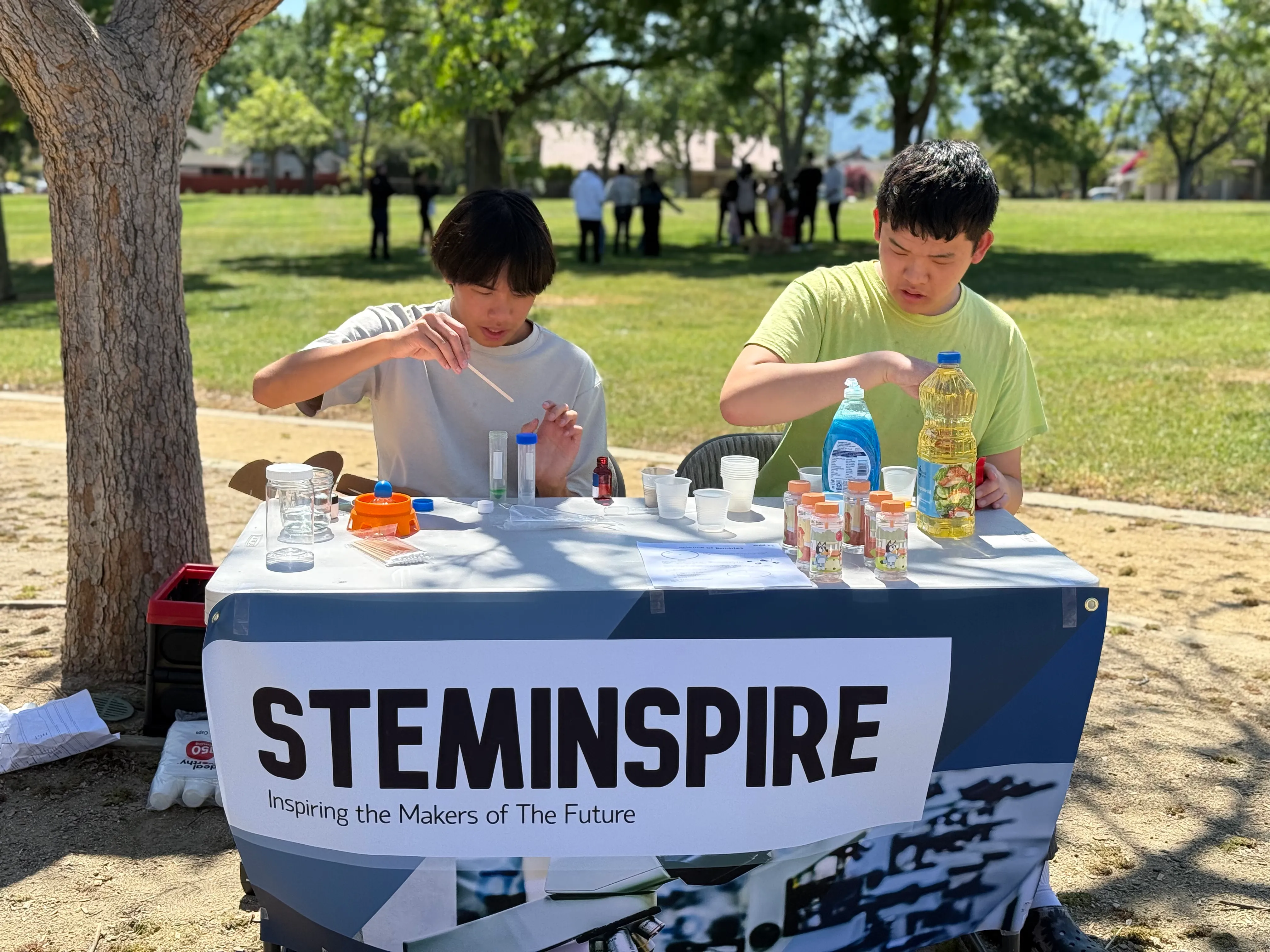 Moore Li and Dylan Zhao getting their science on at Lonehill Park.
