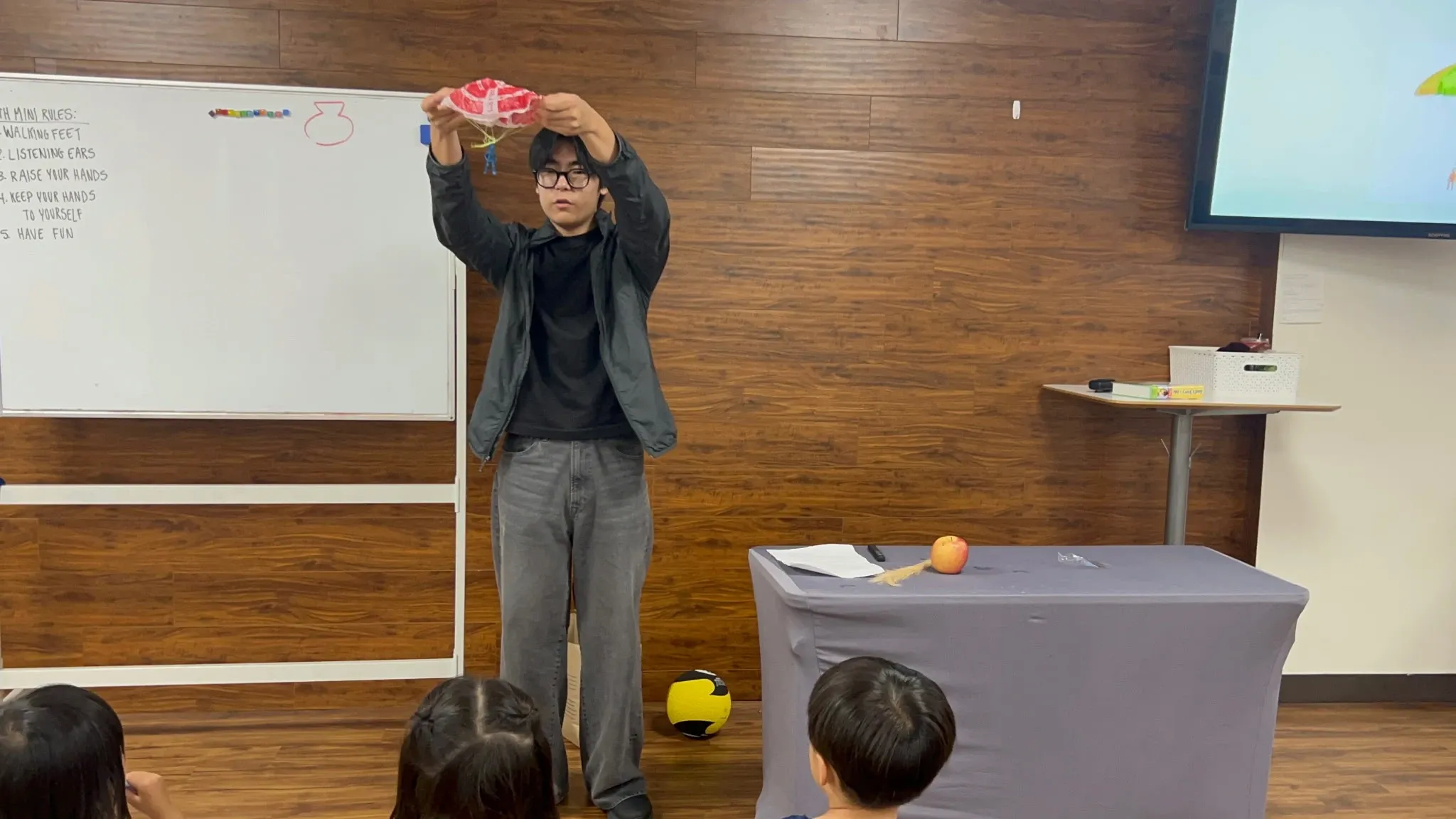 Jack Lee explaining how important air resistance is for parachutes